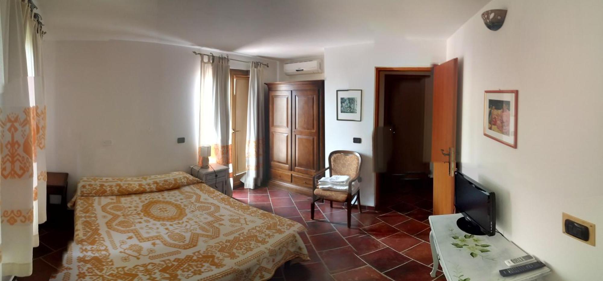 Locanda Tipica Sa Corte Oliena Pokoj fotografie